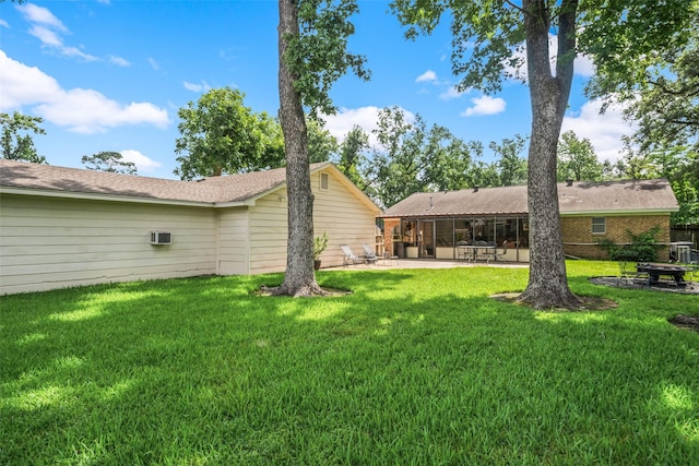 4117 Tilson Ln, Houston, TX 77080 - view of grassy yard featuring a patio and a sunroom