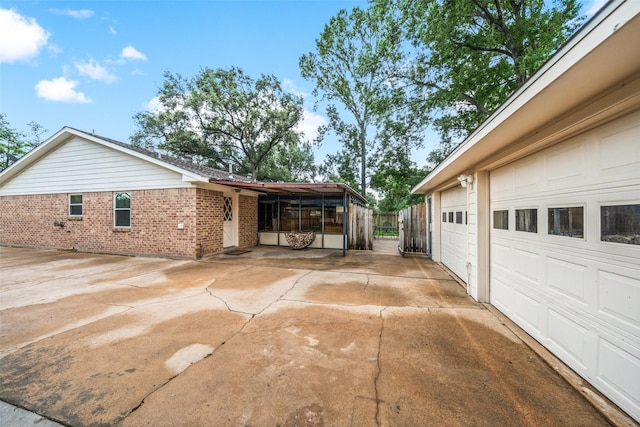 4117 Tilson Ln, Houston, TX 77080 - view of home's exterior with brick siding, driveway, and a garage