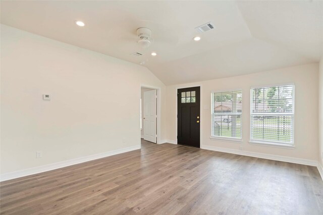 798 Fair St, Houston, TX 77088 - unfurnished living room with vaulted ceiling, wood finished floors, a ceiling fan, and recessed lighting