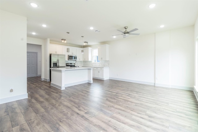 4538 White Rock St, Houston, TX 77051 - unfurnished living room with recessed lighting, a ceiling fan, and light wood-type flooring
