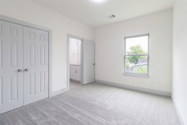 4538 White Rock St, Houston, TX 77051 - unfurnished bedroom with light carpet, ensuite bathroom, and a closet