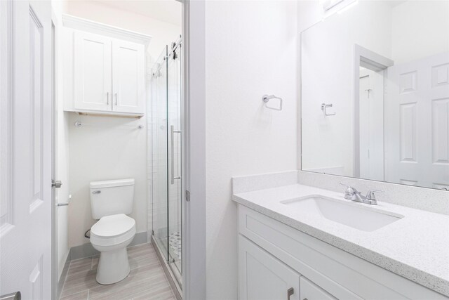 4538 White Rock St, Houston, TX 77051 - full bath with vanity, a shower stall, and wood finished floors