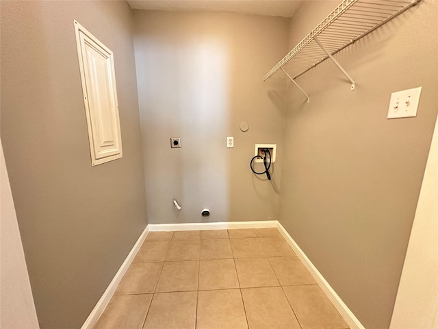 2827 Cypress Island Dr, Houston, TX 77073 - laundry room with hookup for an electric dryer, gas dryer hookup, washer hookup, and light tile patterned floors
