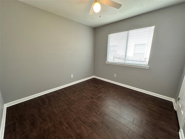 2827 Cypress Island Dr, Houston, TX 77073 - empty room with a ceiling fan, dark wood-style floors, and a textured ceiling