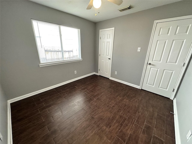 2827 Cypress Island Dr, Houston, TX 77073 - unfurnished bedroom with dark wood-type flooring and ceiling fan