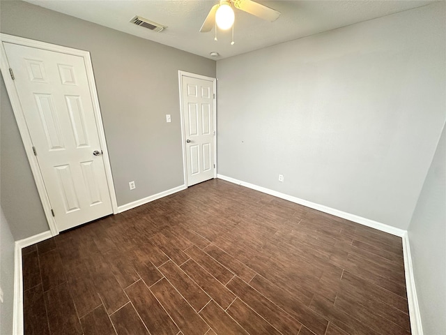 2827 Cypress Island Dr, Houston, TX 77073 - unfurnished bedroom with dark wood-style flooring and ceiling fan