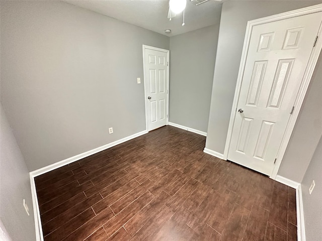 2827 Cypress Island Dr, Houston, TX 77073 - unfurnished bedroom featuring dark wood-type flooring and baseboards