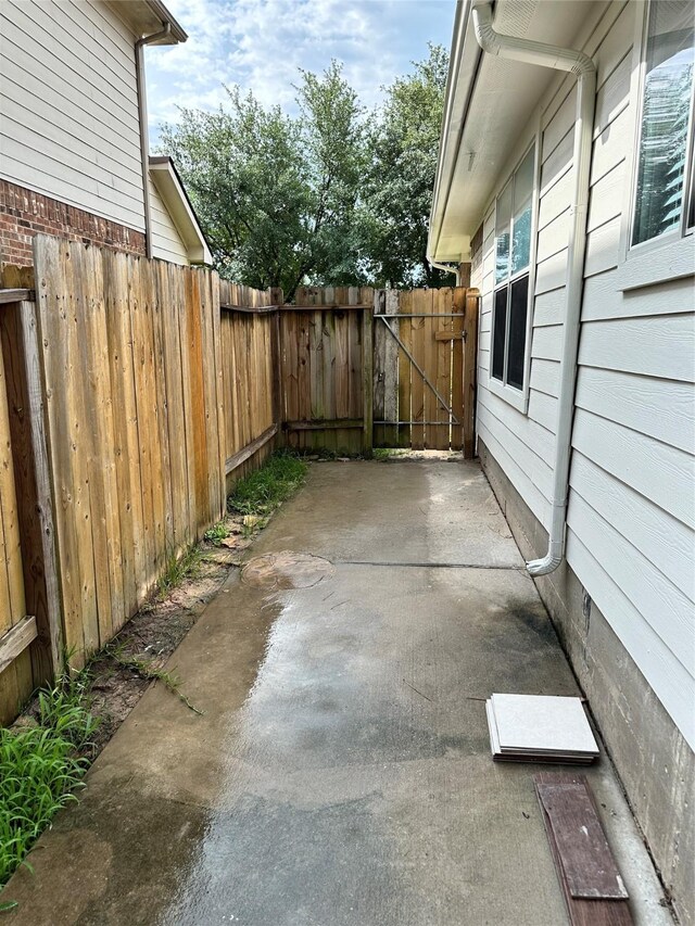 2827 Cypress Island Dr, Houston, TX 77073 - view of patio featuring a gate