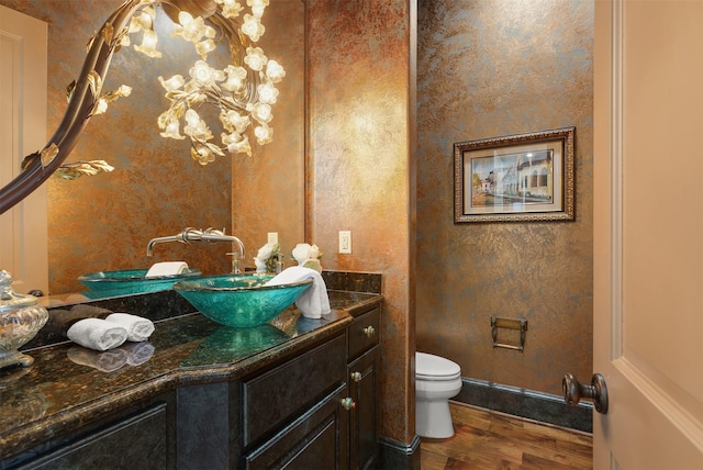 3045 S Island Dr, Seabrook, TX 77586 - bathroom featuring vanity and wood finished floors