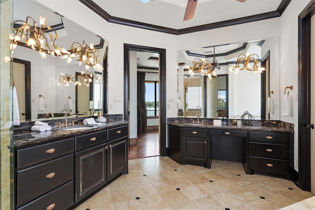 3045 S Island Dr, Seabrook, TX 77586 - full bathroom with a chandelier, ornamental molding, two vanities, tile patterned flooring, and a ceiling fan