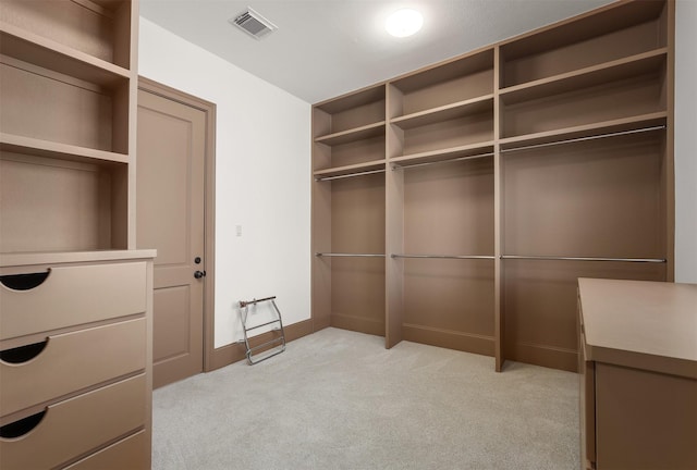 3045 S Island Dr, Seabrook, TX 77586 - walk in closet featuring light colored carpet