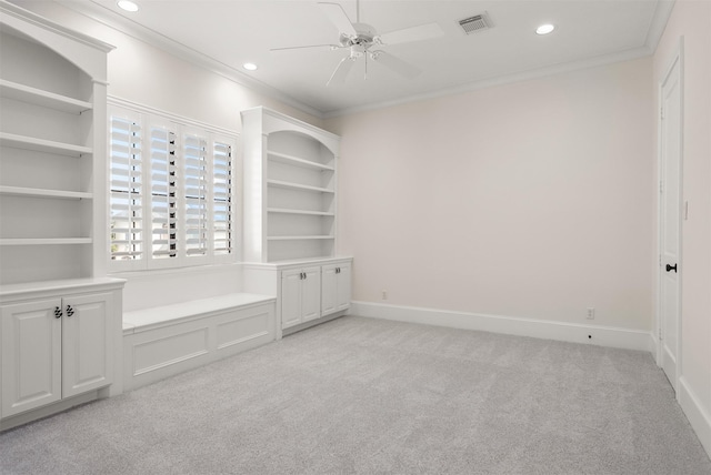 3045 S Island Dr, Seabrook, TX 77586 - unfurnished bedroom featuring light colored carpet, recessed lighting, crown molding, and ceiling fan