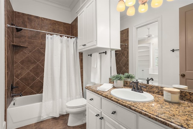 3045 S Island Dr, Seabrook, TX 77586 - bathroom featuring vanity, shower / bath combo with shower curtain, ceiling fan, and tile patterned floors