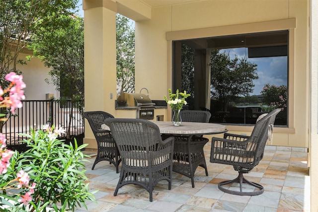 3045 S Island Dr, Seabrook, TX 77586 - view of patio / terrace featuring outdoor dining space and an outdoor kitchen