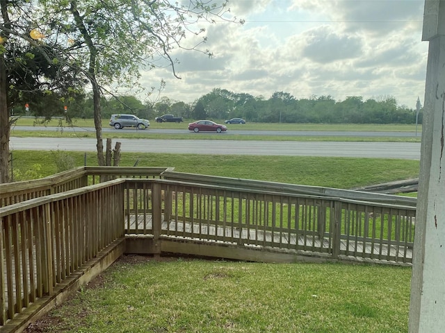 13023 Pleasant Valley Dr, Rosharon, TX 77583 - wooden terrace featuring a yard and a water view