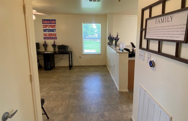 13023 Pleasant Valley Dr, Rosharon, TX 77583 - hall featuring baseboards and tile patterned floors