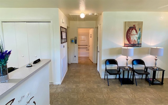 13023 Pleasant Valley Dr, Rosharon, TX 77583 - hall featuring baseboards and attic access