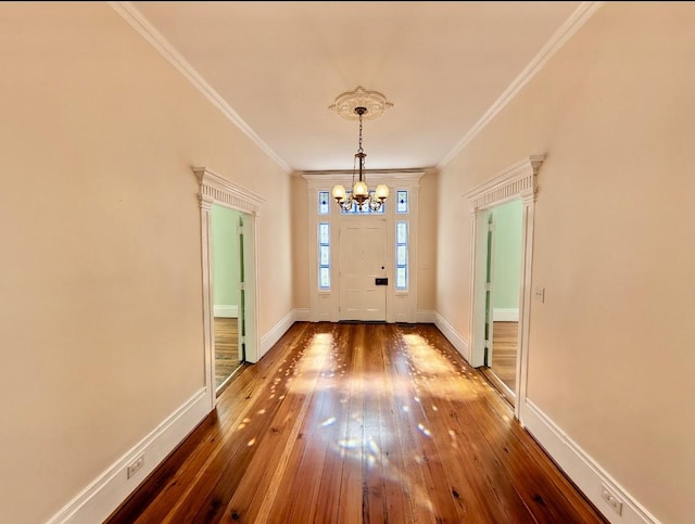 309 E Robert Toombs Ave, Washington, GA 30673 - entrance foyer featuring a chandelier, hardwood / wood-style floors, and ornamental molding