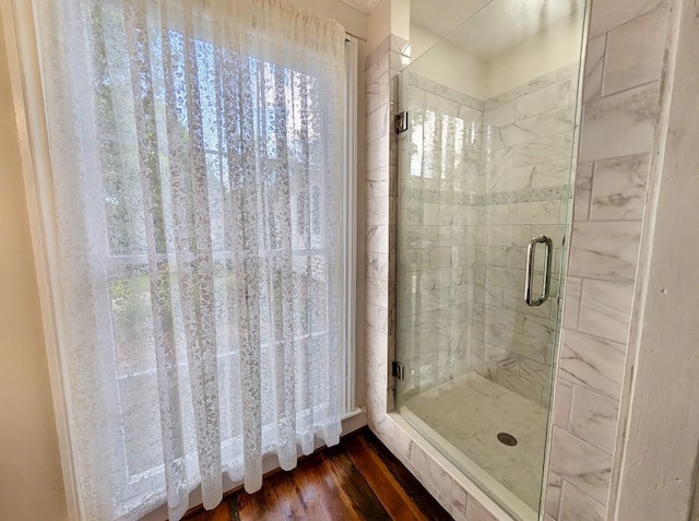 309 E Robert Toombs Ave, Washington, GA 30673 - bathroom with a shower stall and wood finished floors
