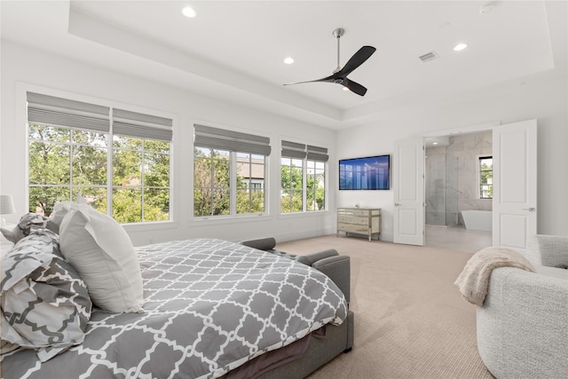 2324 Albans Rd, Houston, TX 77005 - carpeted bedroom with multiple windows, recessed lighting, a tray ceiling, ceiling fan, and ensuite bathroom