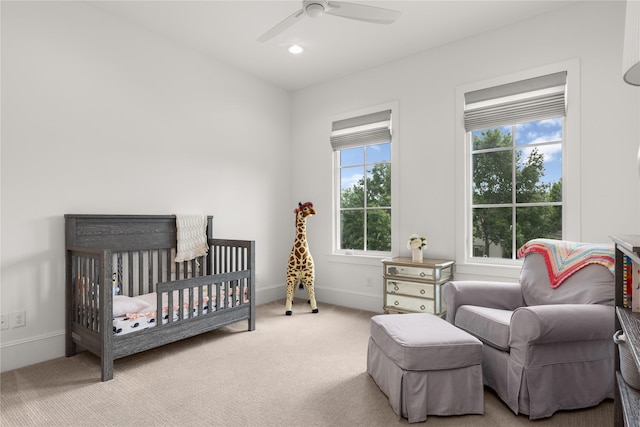 2324 Albans Rd, Houston, TX 77005 - carpeted bedroom with a nursery area and ceiling fan
