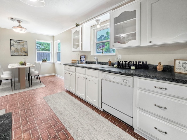 723 Pas Trl, Houston, TX 77336 - kitchen featuring white dishwasher, white cabinetry, dark countertops, and glass insert cabinets