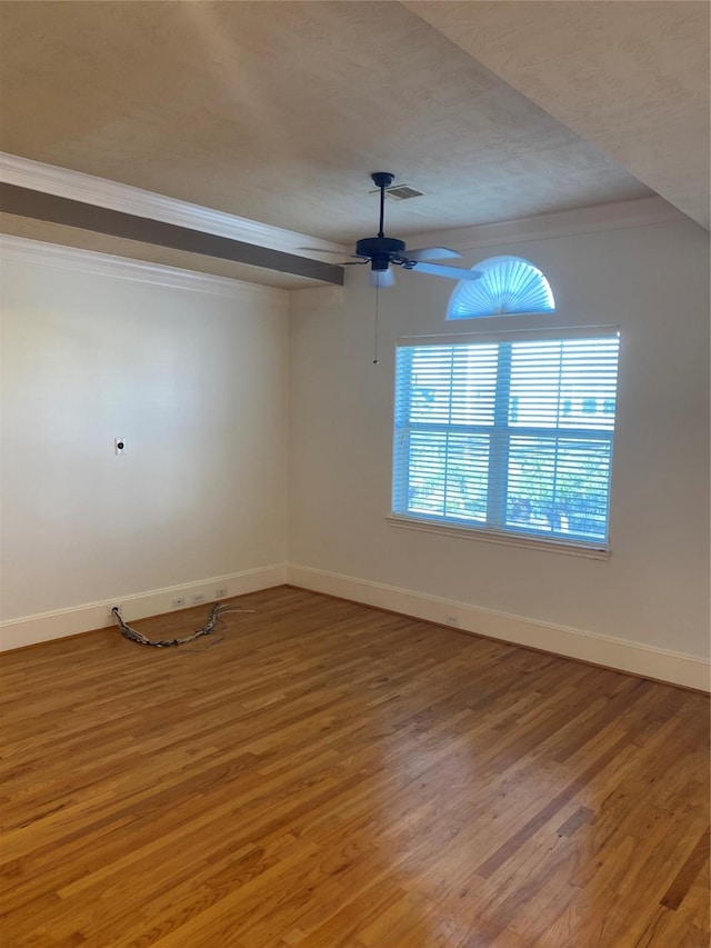 1711 Aden Mist Dr, Houston, TX 77003 - spare room with a ceiling fan, light wood-style floors, crown molding, and a textured ceiling