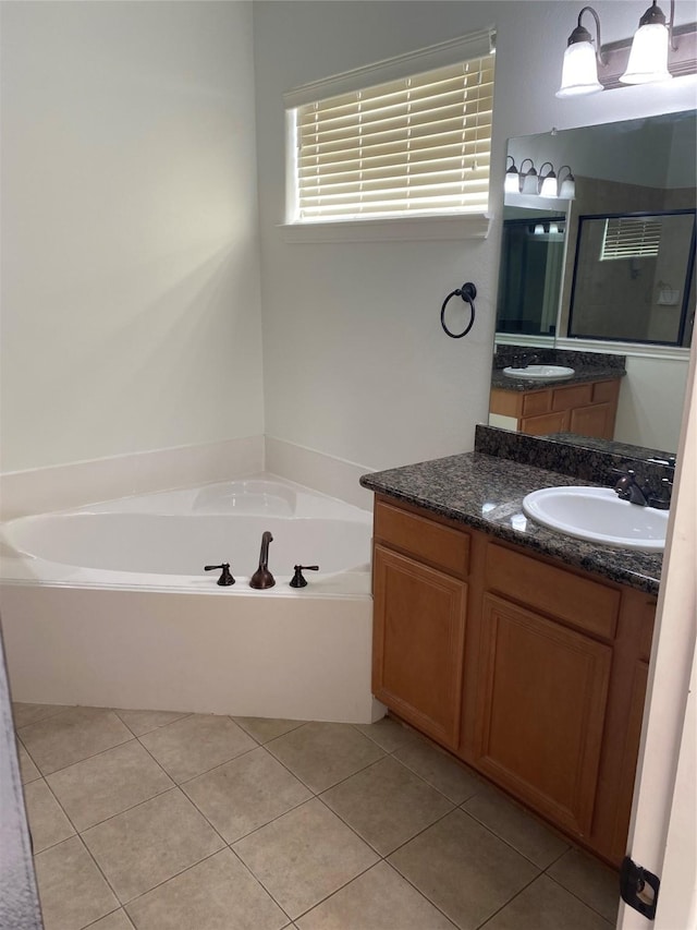 1711 Aden Mist Dr, Houston, TX 77003 - bathroom featuring a garden tub, vanity, tile patterned flooring, and a shower stall