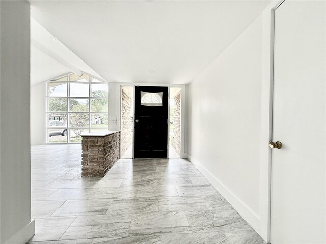 4015 Leeshire Dr, Houston, TX 77025 - foyer entrance featuring baseboards and light marble finish floors