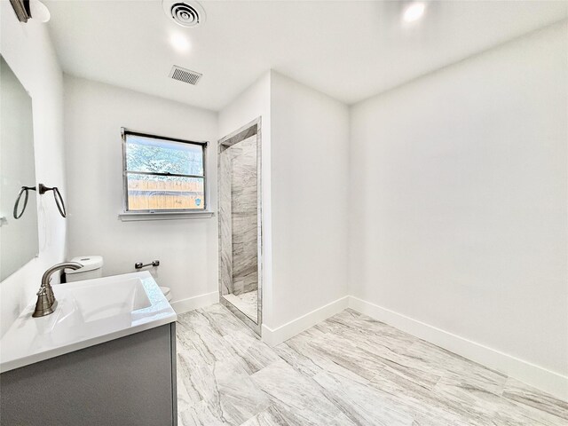 4015 Leeshire Dr, Houston, TX 77025 - bathroom featuring vanity and a tile shower