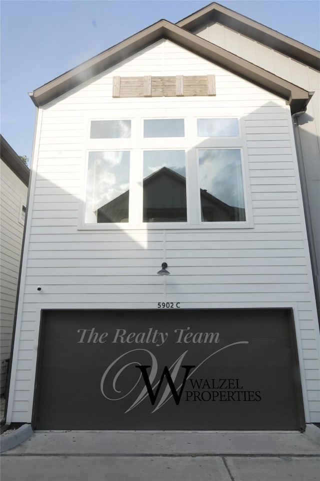 5902 Gardendale Dr Unit C, Houston, TX 77092 - view of property exterior with an attached garage