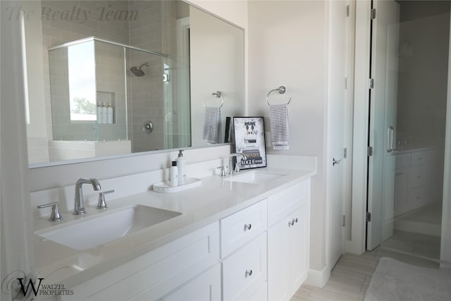 5902 Gardendale Dr Unit C, Houston, TX 77092 - bathroom with a shower stall and double vanity