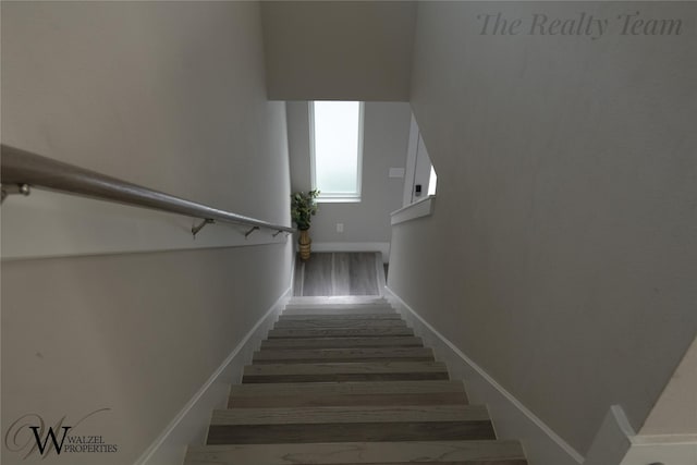 5902 Gardendale Dr Unit C, Houston, TX 77092 - stairway featuring wood finished floors and baseboards