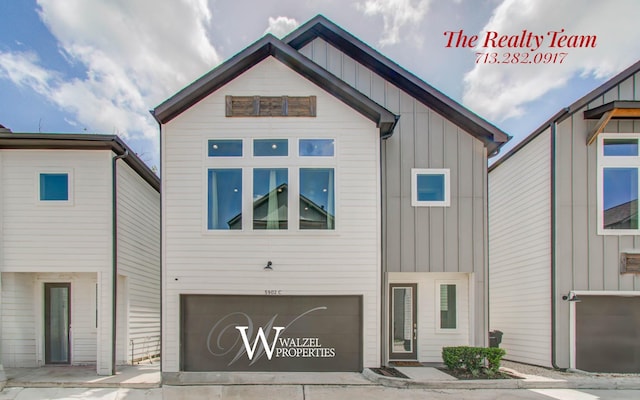 5902 Gardendale Dr Unit C, Houston, TX 77092 - view of front of home featuring an attached garage and board and batten siding