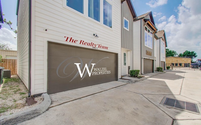 5902 Gardendale Dr Unit C, Houston, TX 77092 - view of building exterior featuring a garage and driveway