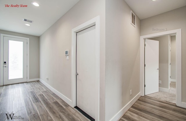 5902 Gardendale Dr Unit C, Houston, TX 77092 - corridor with wood finished floors and recessed lighting
