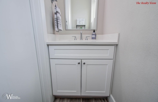 5902 Gardendale Dr Unit C, Houston, TX 77092 - bathroom with vanity and a textured wall