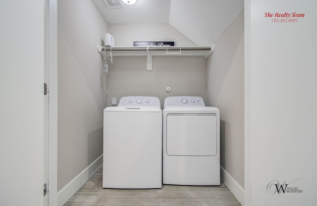 5902 Gardendale Dr Unit C, Houston, TX 77092 - laundry room with independent washer and dryer and wood finished floors