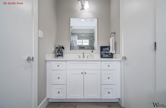 5902 Gardendale Dr Unit C, Houston, TX 77092 - bathroom with vanity and wood finished floors