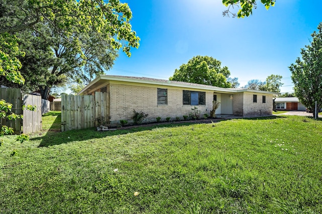 1033 25th Ave N, Texas City, TX 77590 - view of front facade featuring brick siding
