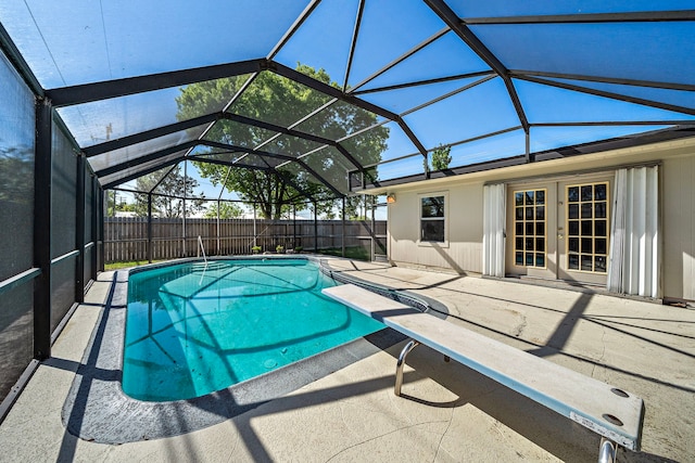 1033 25th Ave N, Texas City, TX 77590 - view of swimming pool with a patio, french doors, and glass enclosure