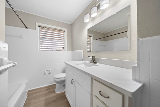 1033 25th Ave N, Texas City, TX 77590 - bathroom with crown molding, wood finished floors, vanity, and  shower combination