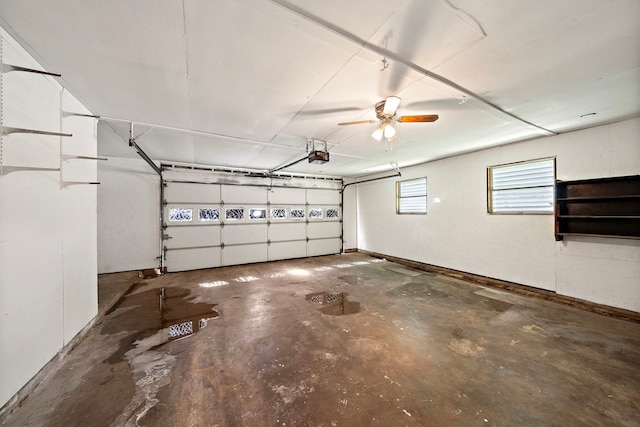 1033 25th Ave N, Texas City, TX 77590 - garage with a garage door opener and ceiling fan