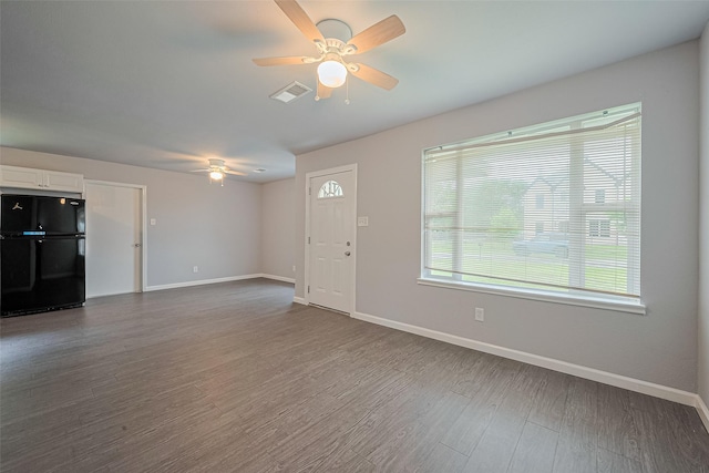3602 Castledale Dr, Houston, TX 77093 - unfurnished living room featuring ceiling fan and dark wood-style floors