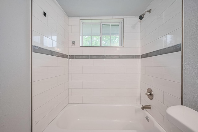 3602 Castledale Dr, Houston, TX 77093 - bathroom featuring shower / washtub combination and a textured wall