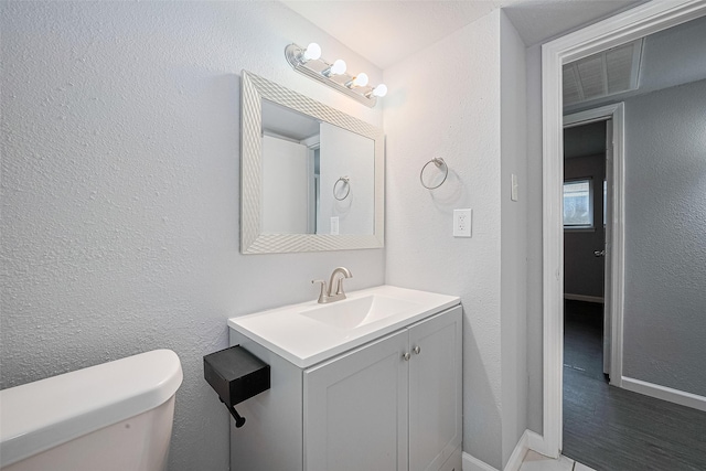 3602 Castledale Dr, Houston, TX 77093 - half bath featuring vanity and a textured wall