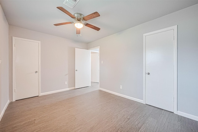 3602 Castledale Dr, Houston, TX 77093 - unfurnished bedroom with wood finished floors and ceiling fan