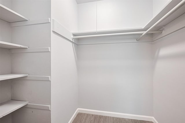 3602 Castledale Dr, Houston, TX 77093 - spacious closet with wood finished floors