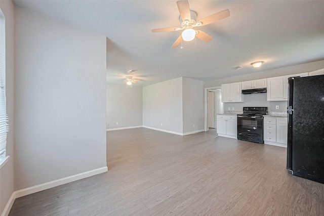 3602 Castledale Dr, Houston, TX 77093 - kitchen with black appliances, a ceiling fan, white cabinets, and light wood finished floors