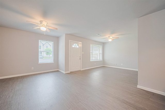 3602 Castledale Dr, Houston, TX 77093 - unfurnished living room with a ceiling fan and wood finished floors